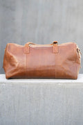 Weekendbag i cognacfarvet skinn