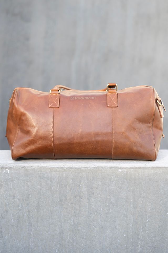 Weekendbag i cognacfarvet skinn